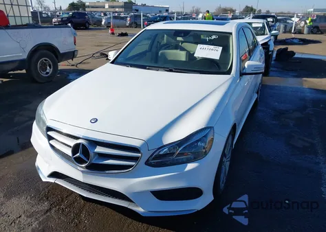 2014 Mercedes-Benz E 350 из США, поврежденный, VIN WDDHF5KB1EB061940